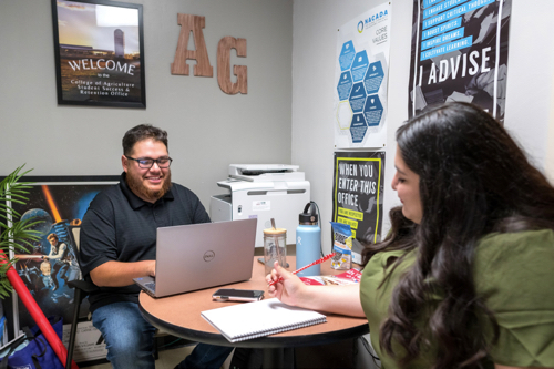 Agriculture advisor and student